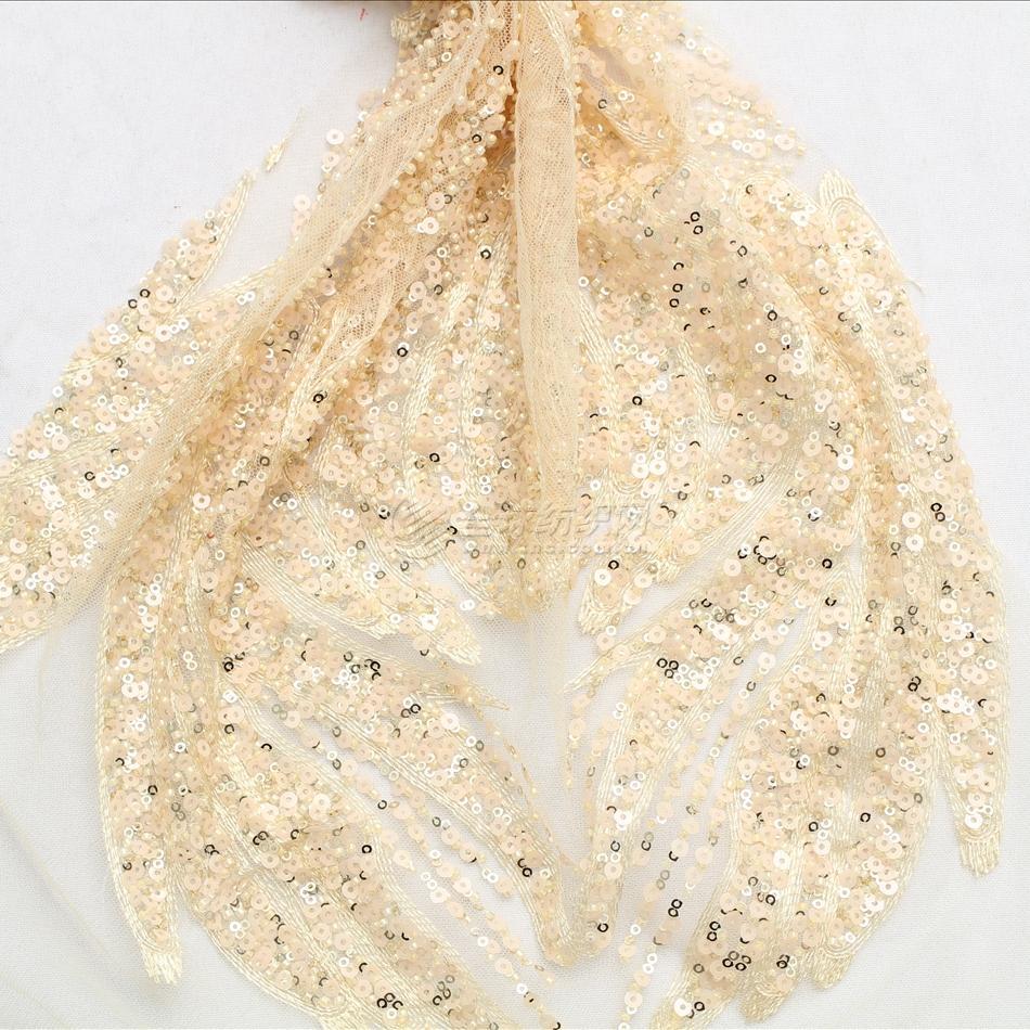 定位网布亮片绣 针织珠子刺绣网纱面料 连衣裙婚纱礼服面料